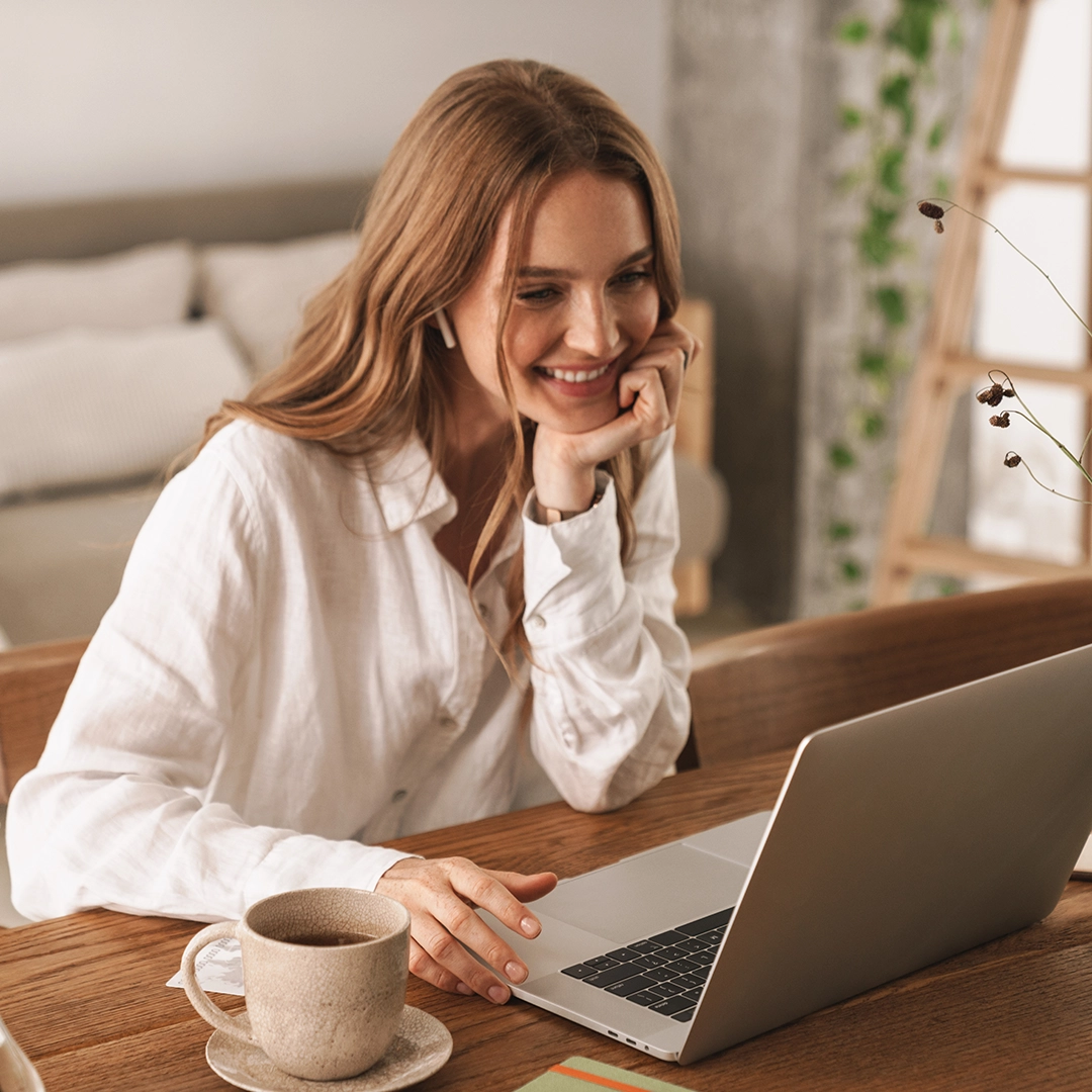 Women using computer to bank online.